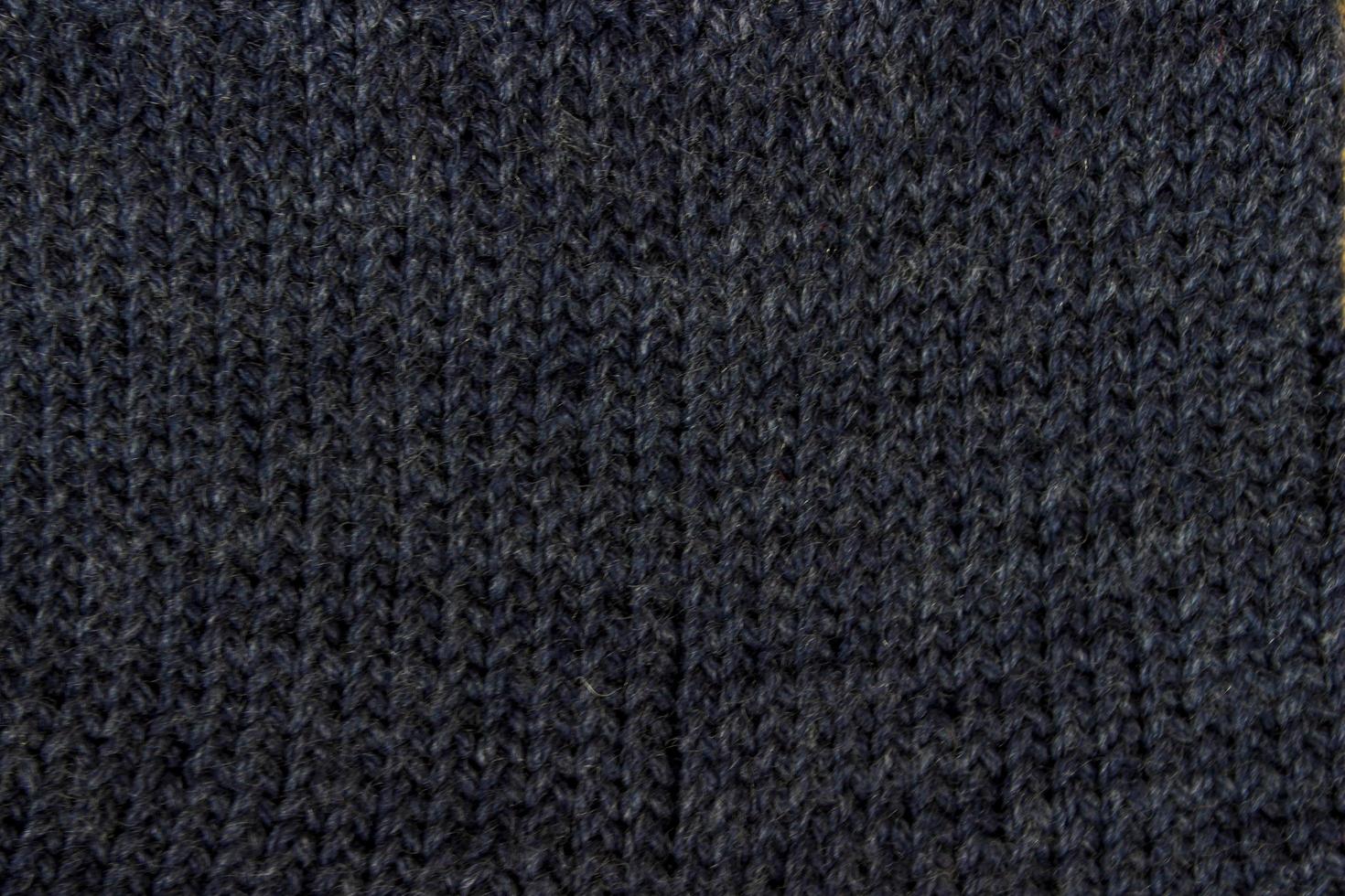 texture d'un tissu noir. tricot photo