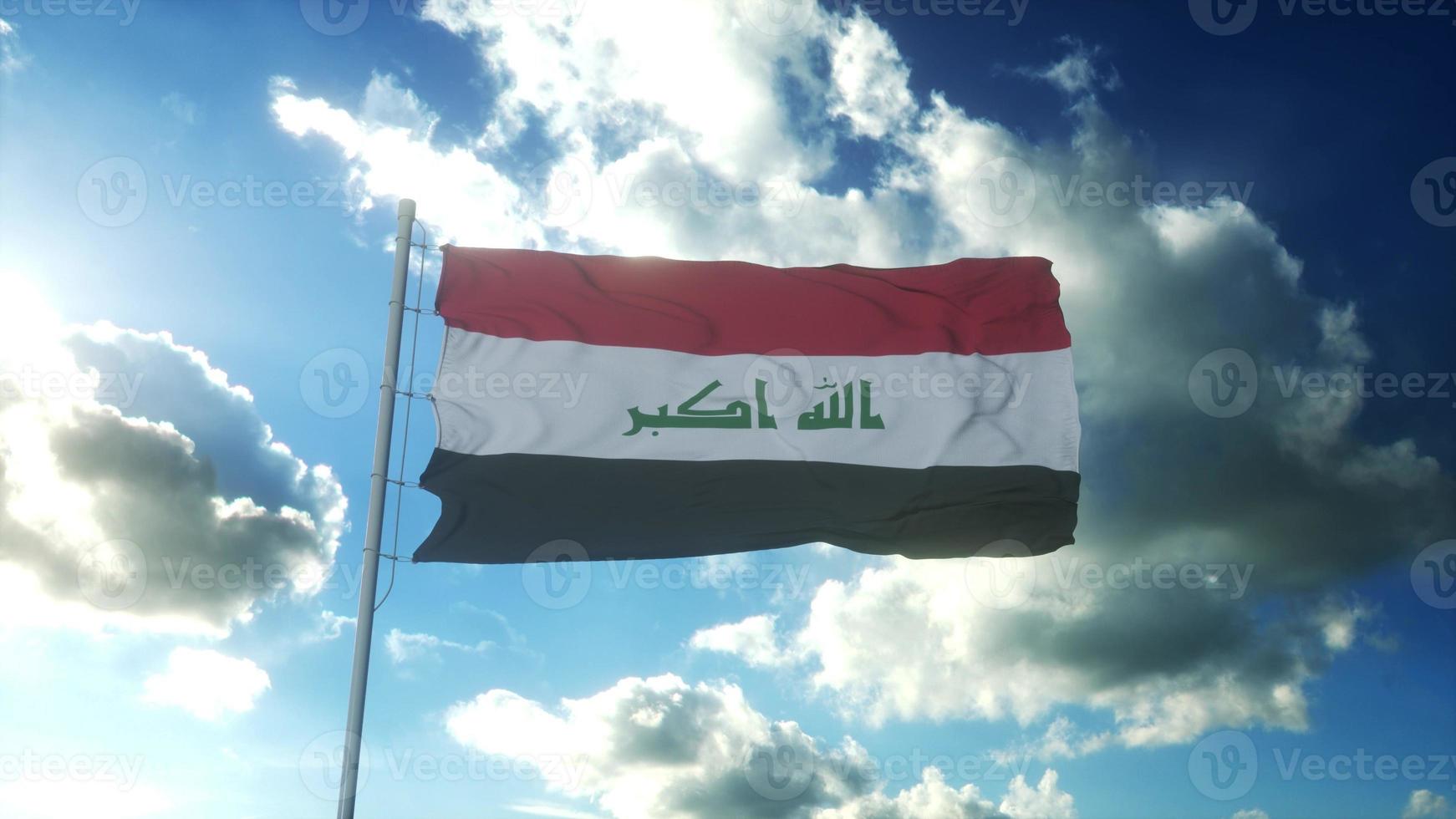 drapeau de l'irak agitant au vent contre le beau ciel bleu. rendu 3d photo