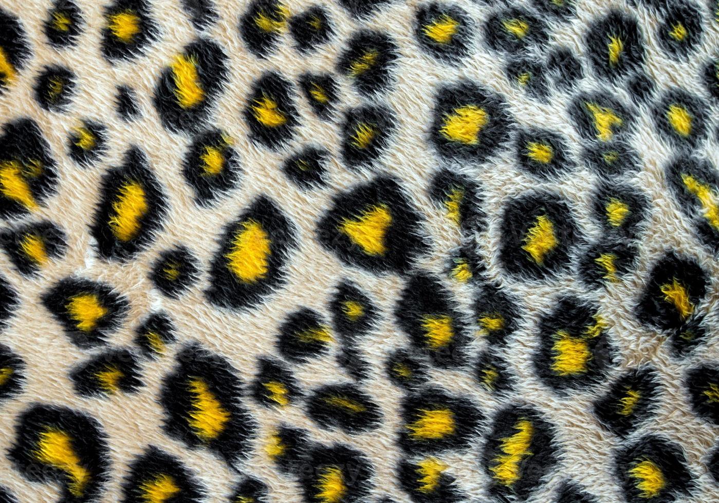 tissu en similicuir à motif de peau de léopard photo