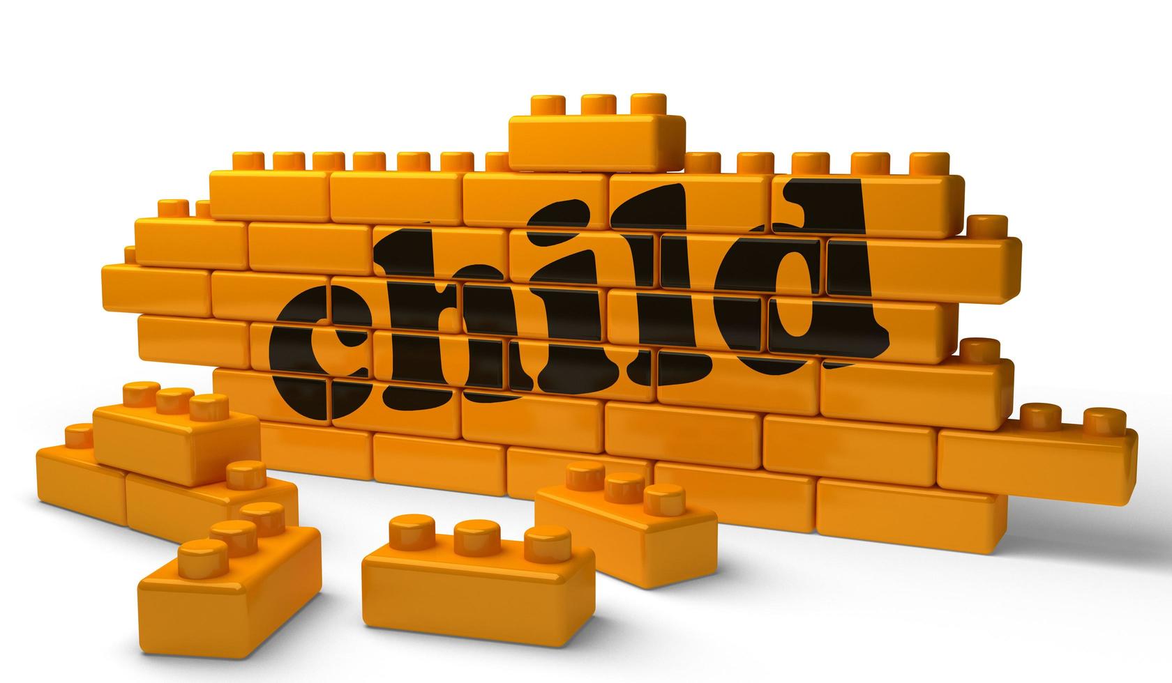 mot d'enfant sur le mur de briques jaunes photo