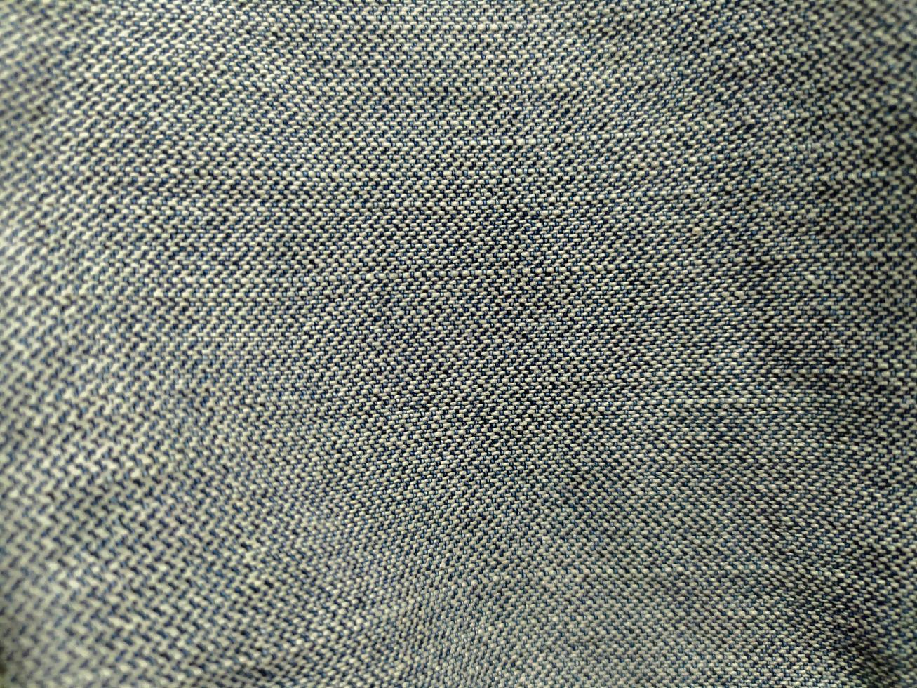fond de texture de tissu rose avec motif carré photo