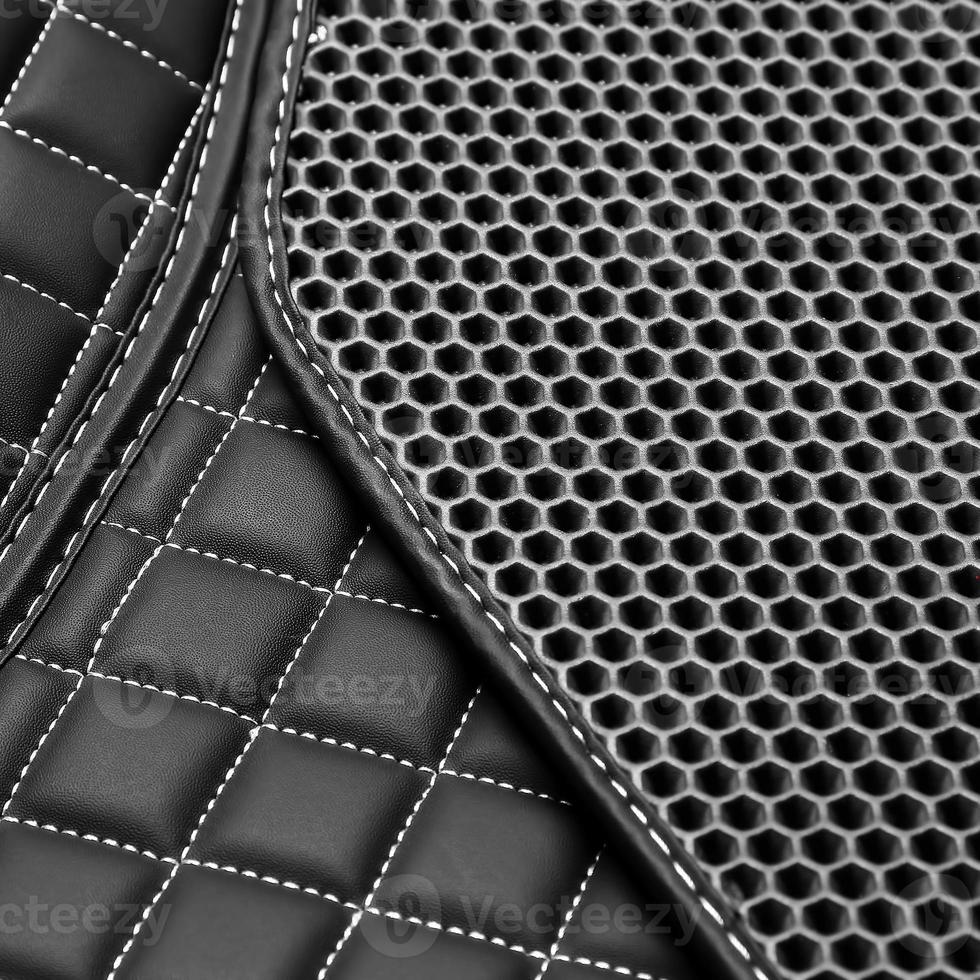 texture de fond en cuir noir avec motif carré et point, macro photo