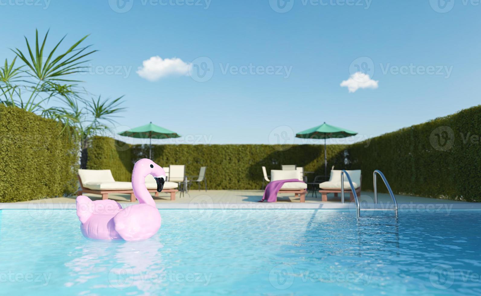 flotteur flamant rose sur une terrasse avec piscine photo