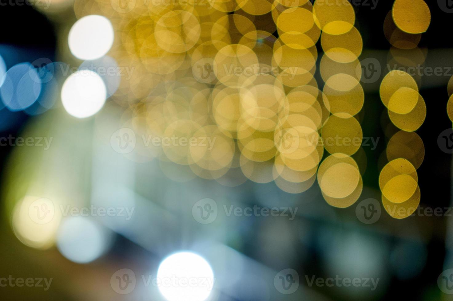 lumières colorées le jour de l'an, lumières de cercle bokeh, image d'arrière-plan avec espace de copie. photo