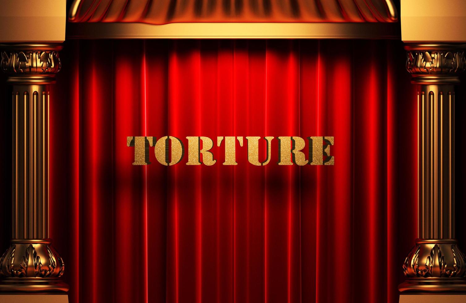 torturer le mot d'or sur le rideau rouge photo