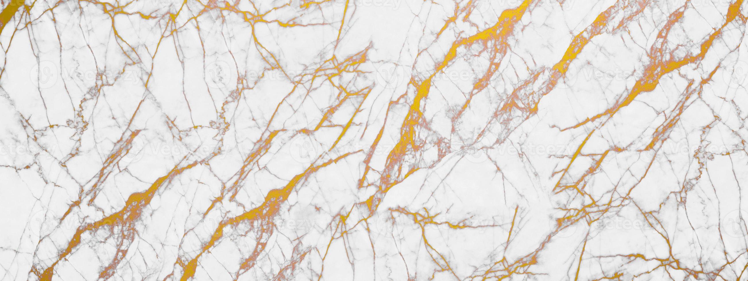 texture de marbre blanc et doré pour la conception décorative de fond ou de carrelage. photo