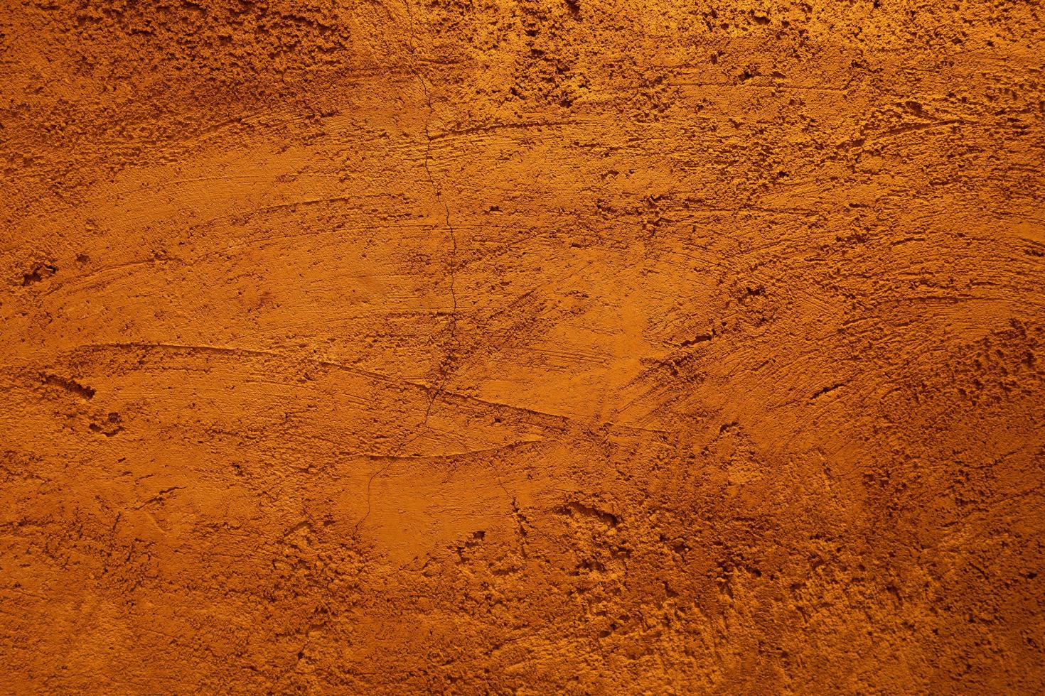 fond de texture de mur de plâtre brun doré avec motif de rayures et de fissures photo