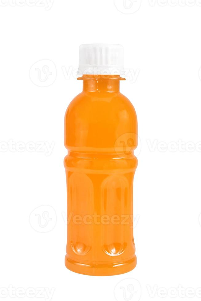 jus d'orange dans une bouteille isolé sur blanc photo