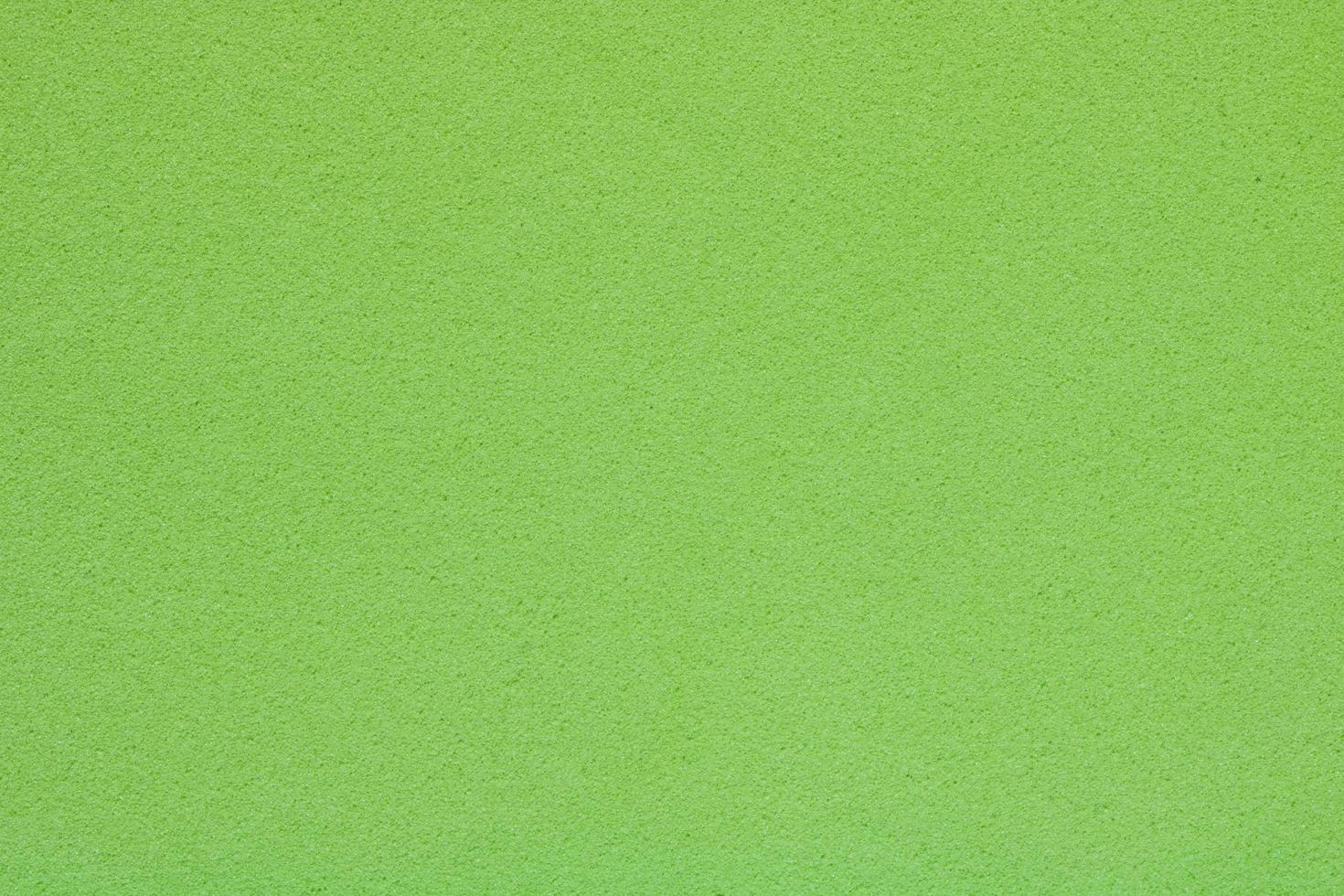 texture d'éponge vert clair, fond abstrait photo