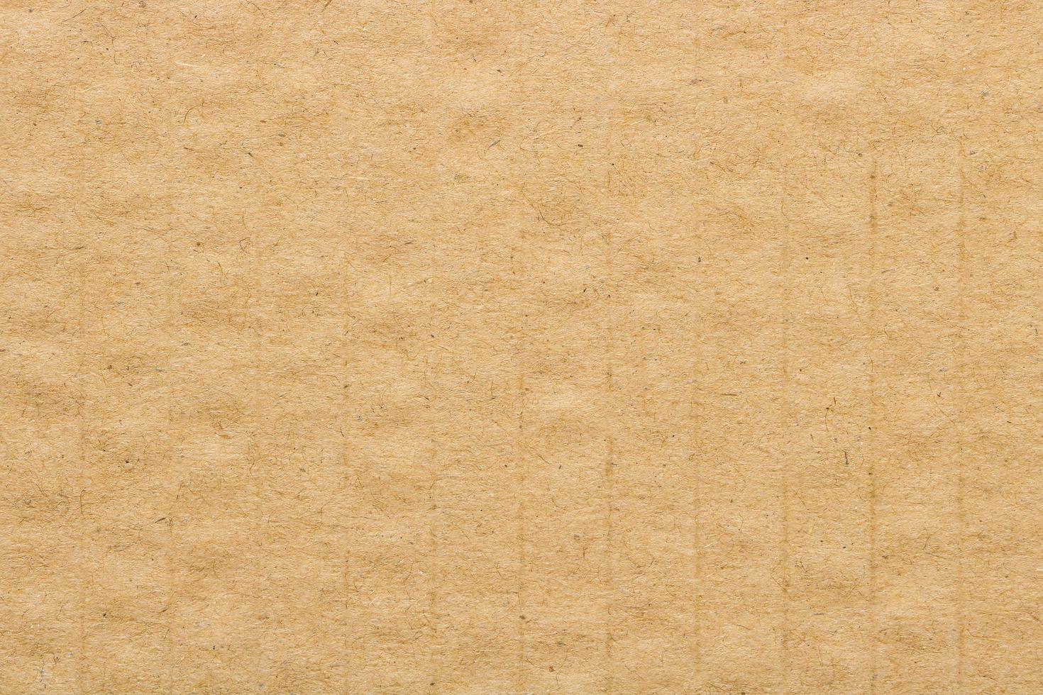 texture de carton brun, fond de boîte de papier. photo
