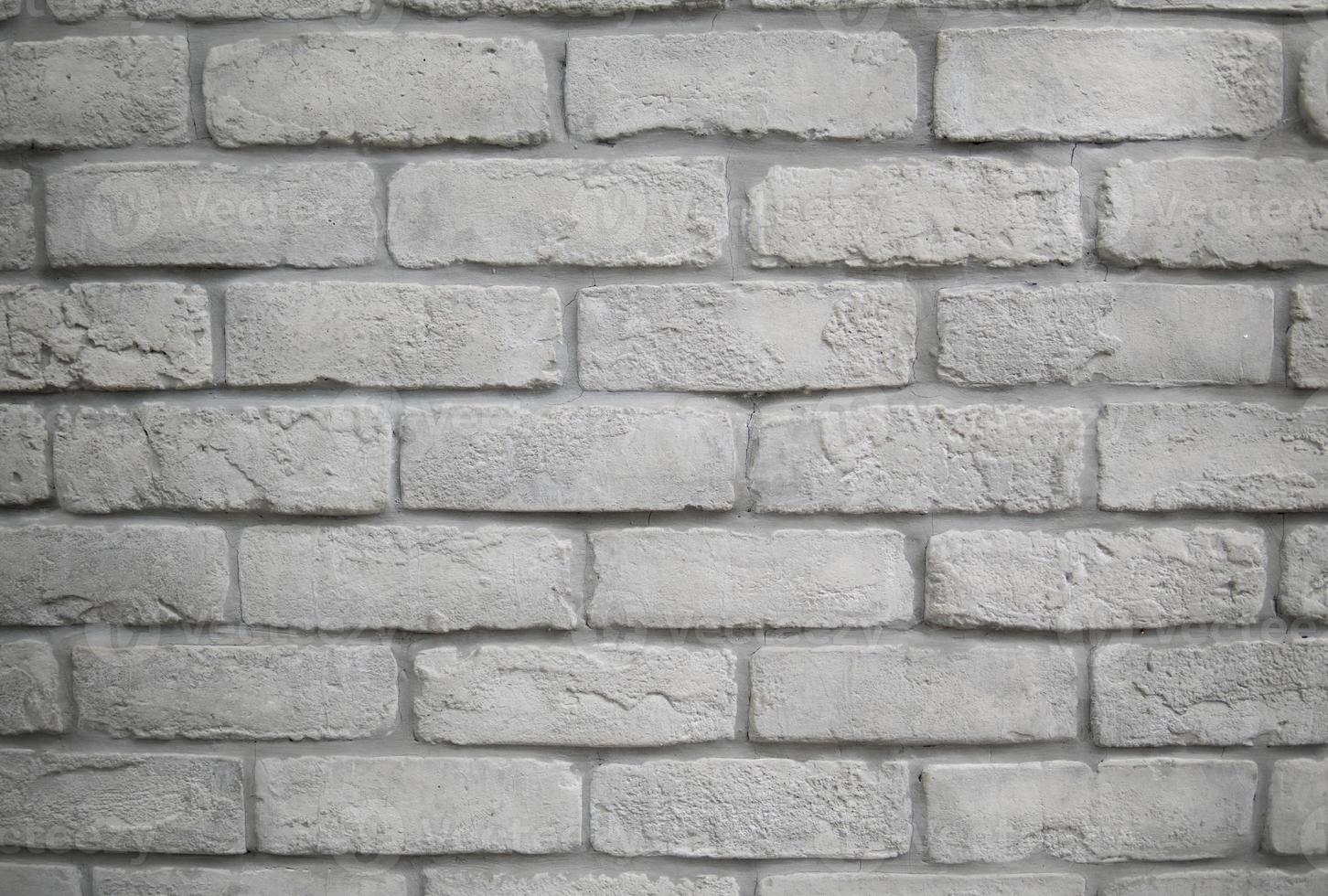 fond texturé de mur de brique gris blanc moderne. photo