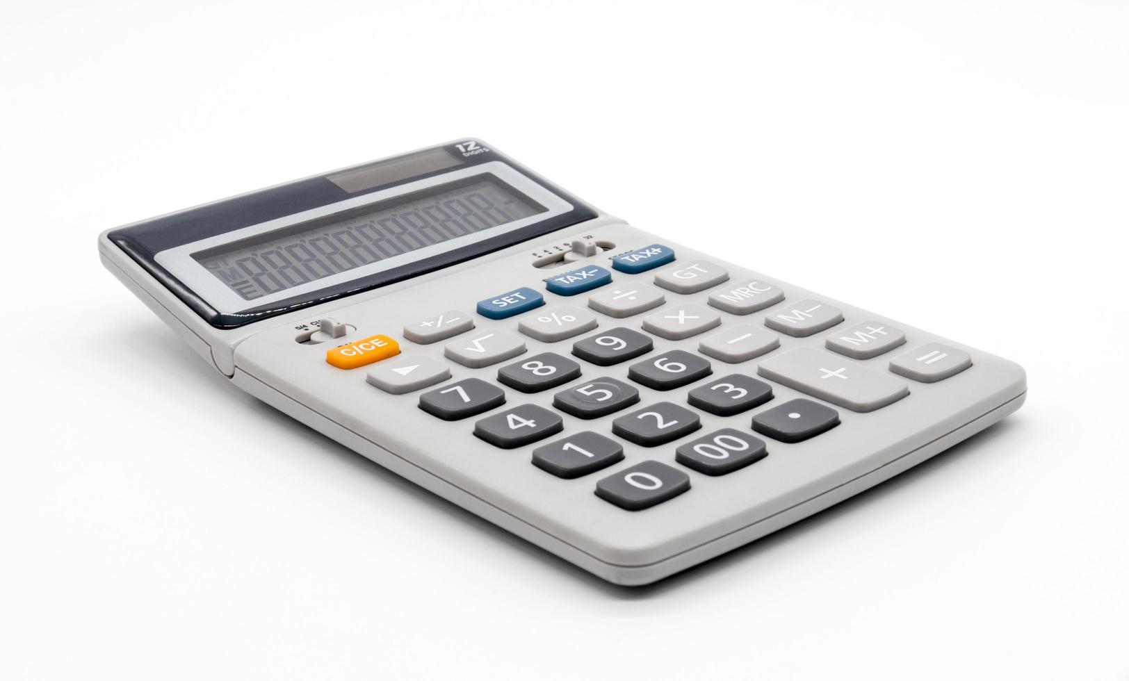 calculatrice sur fond blanc photo