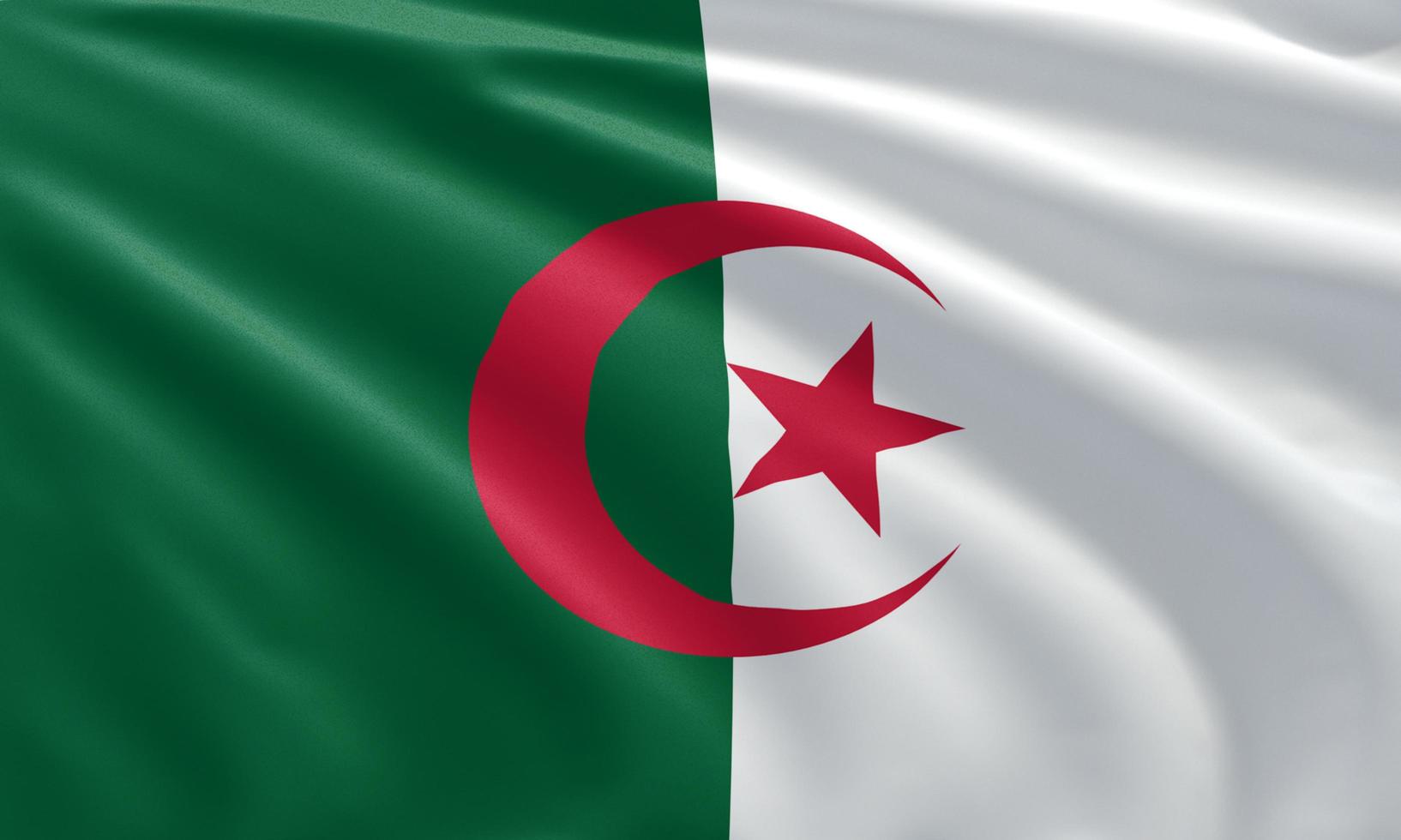 gros plan agitant le drapeau de l'algérie photo