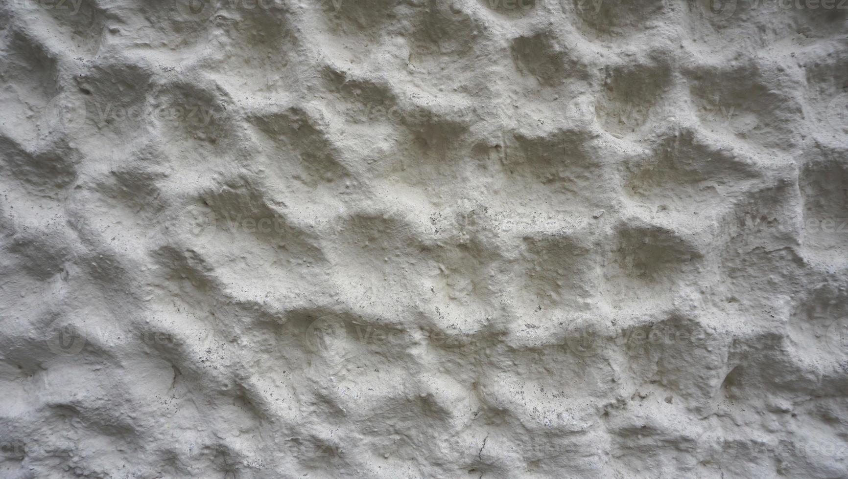 texture bulle sur mur de ciment blanc finition horizontale photo