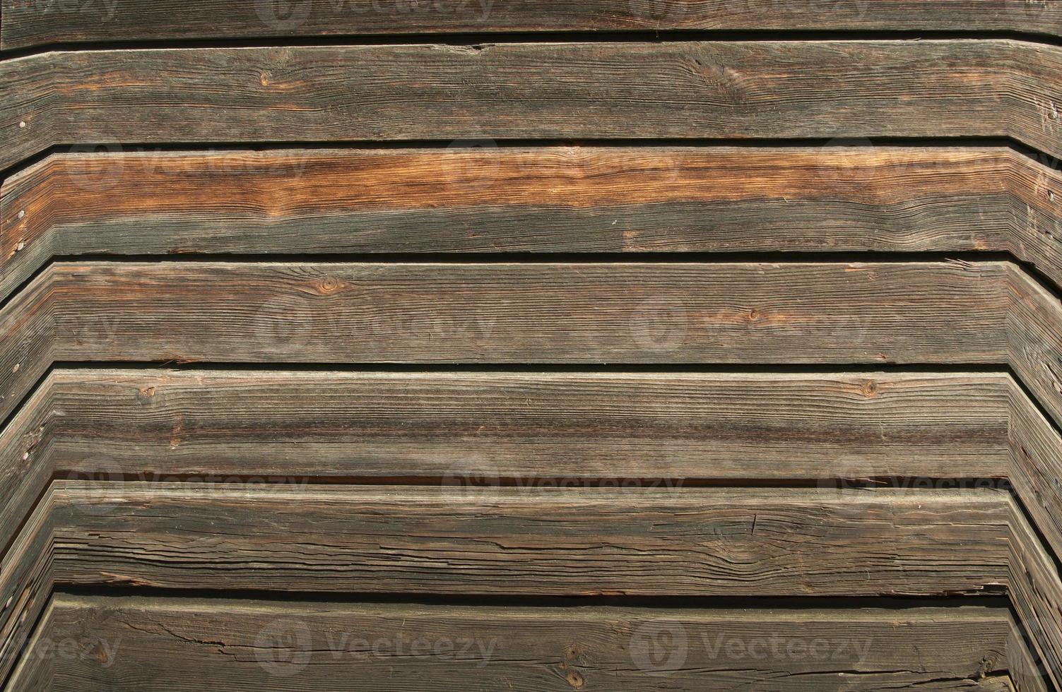 le mur de bois de grange brun. motif de fond de texture de mur. photo