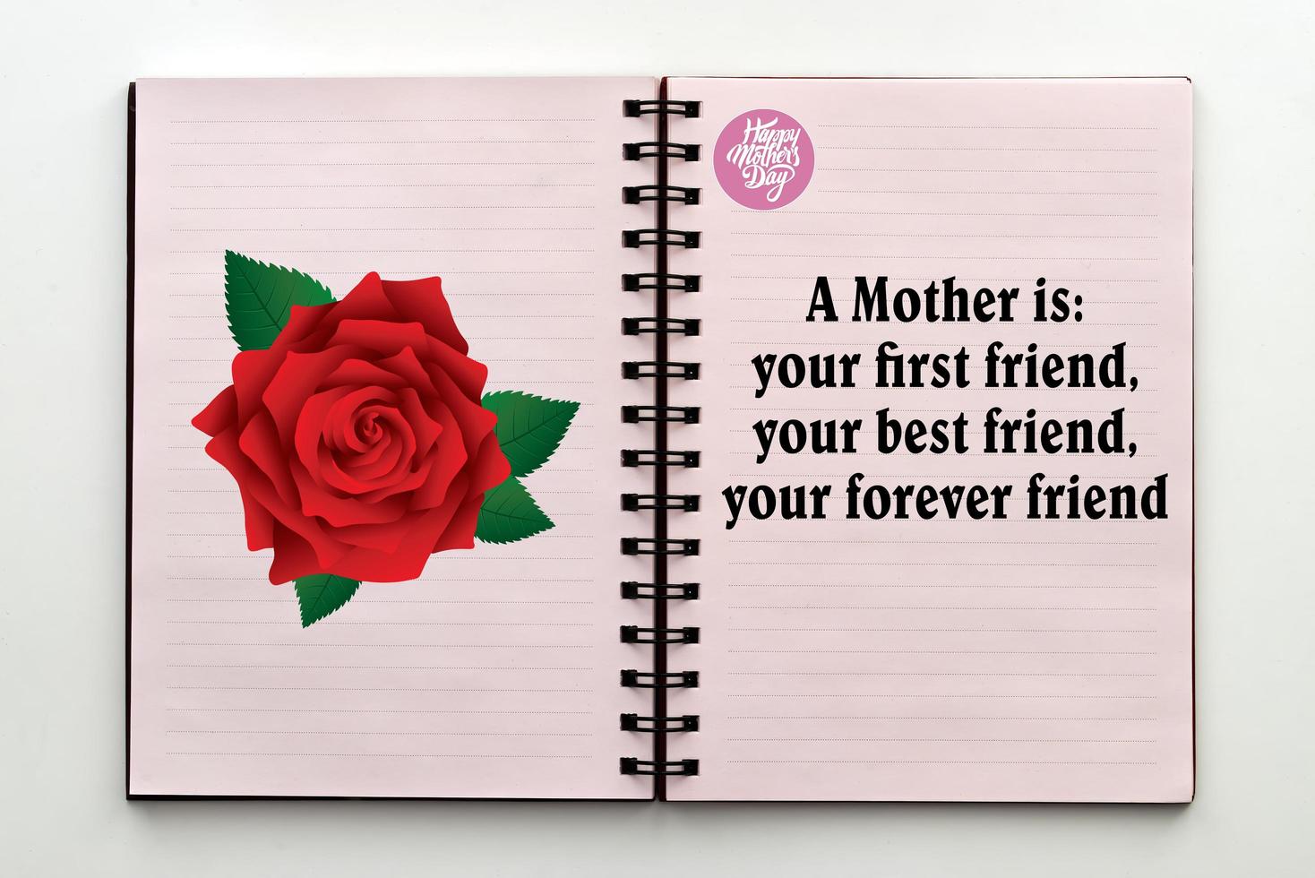 bonne fête des mères avec citation écrite à l'intérieur d'un cahier ouvert. photo
