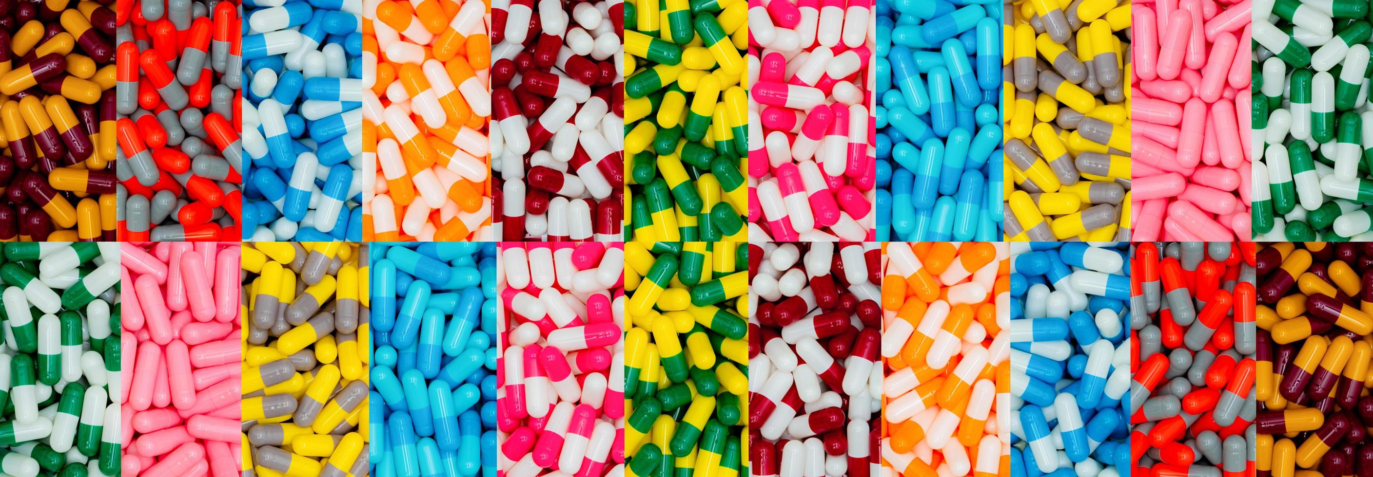 vue de dessus de pilules gélules multicolores. industrie pharmaceutique. de nombreux antibiotiques, analgésiques, suppléments gélules. production de gélules. bannière de pharmacie. sélection des médicaments. produits pharmaceutiques. photo