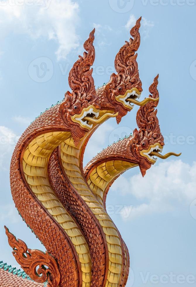 sculpture de dragon en bronze photo