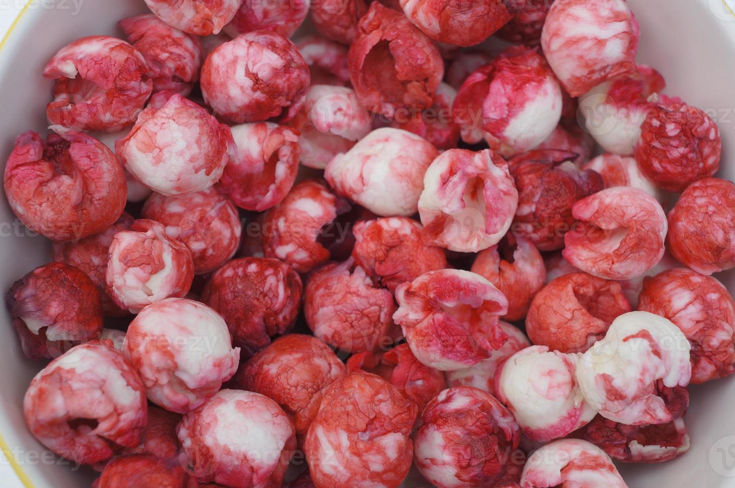 manille tamarin fruit rouge rose goût sucré graines concept photo