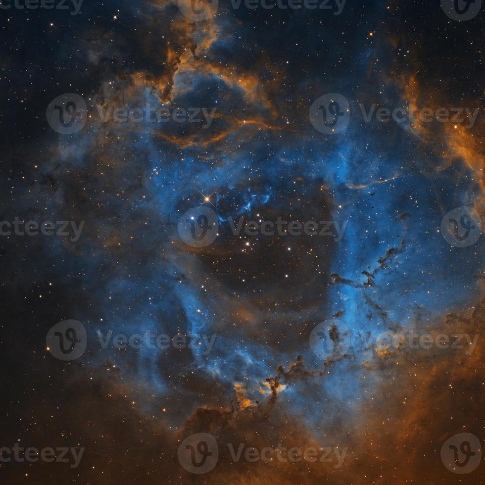 nébuleuse de la rosette imagée à travers les télescopes robotiques distants du télescope en direct dans des filtres à bande étroite sho, nébulosité bleue et jaune dans la palette hubble d'un grand objet spatial photo