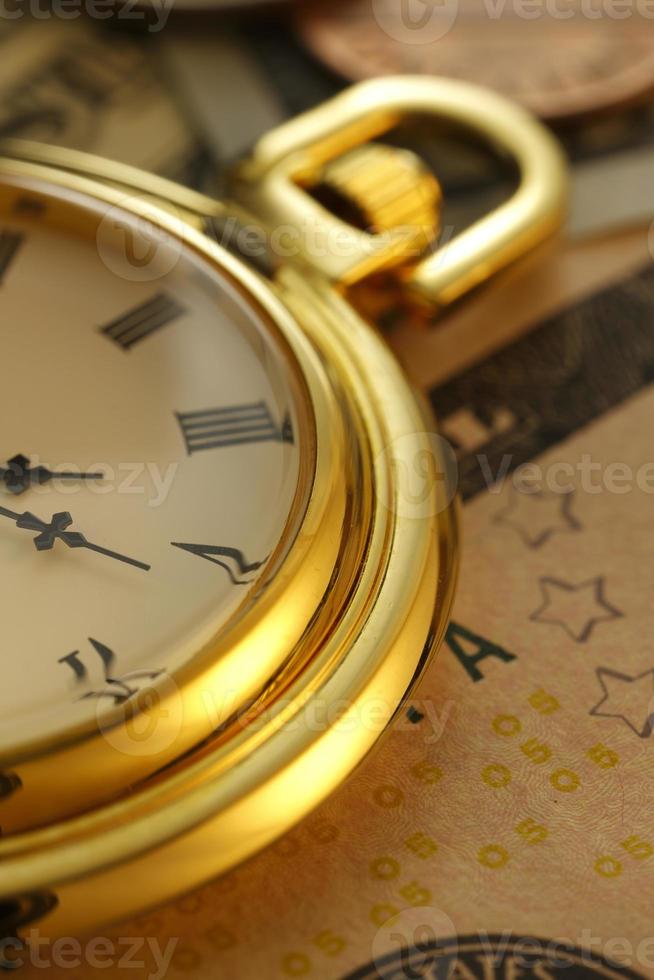 temps et argent. horloge en dollars américains - images de stock libres de droits photo
