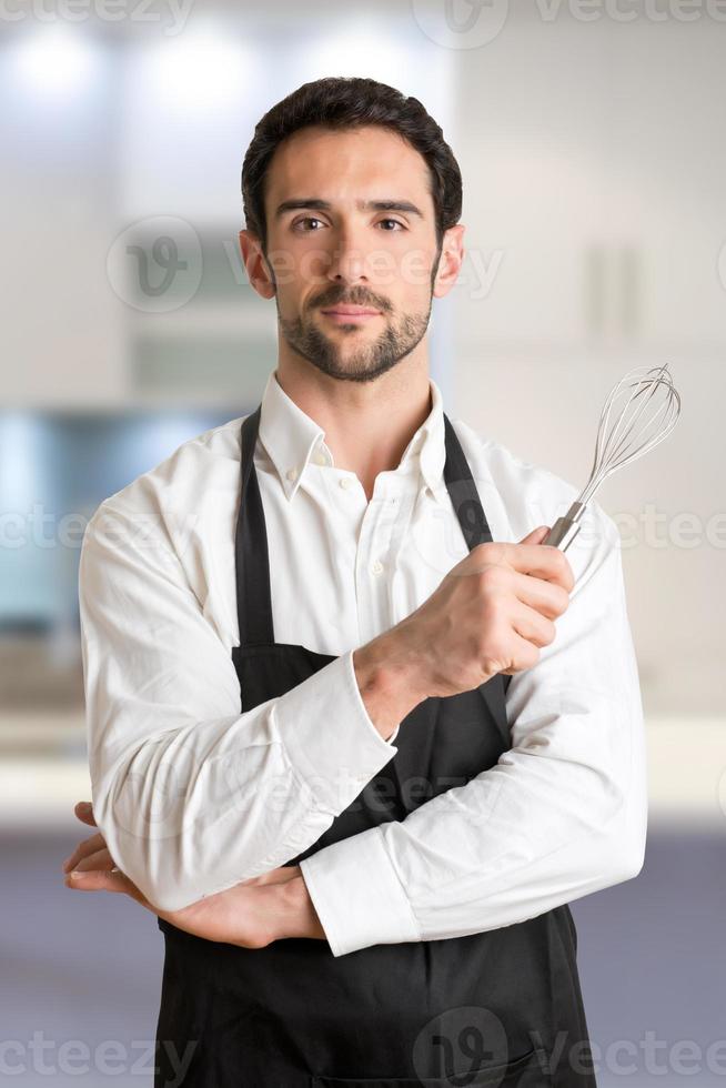 cuisinière mâle, à, tablier, sourire photo
