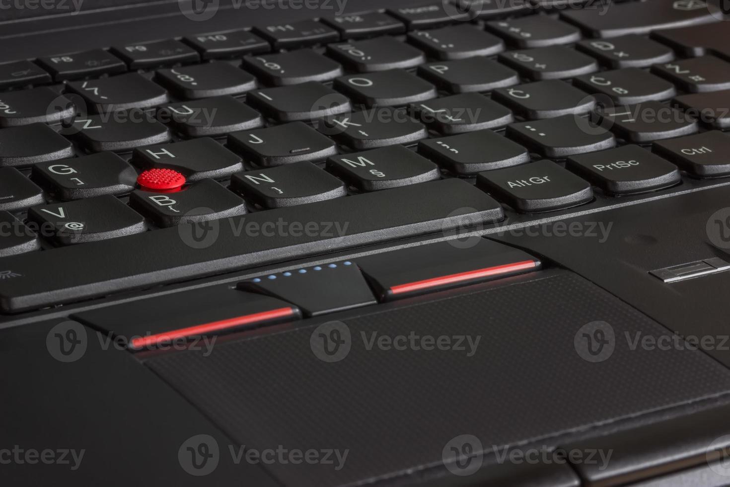 claviers d'ordinateur portable avec dispositif de pointage et lecteur d'empreintes digitales deta photo