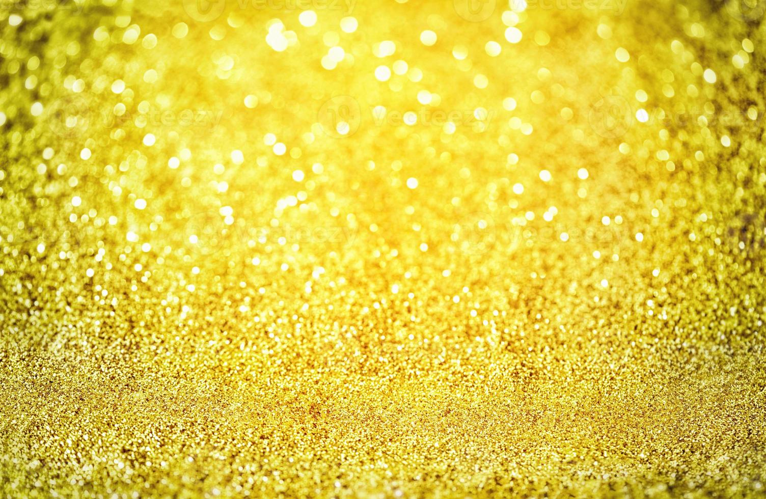 texture d'éclairage bokeh de paillettes dorées fond abstrait flou pour l'anniversaire, l'anniversaire, le mariage, le réveillon du nouvel an ou noël photo