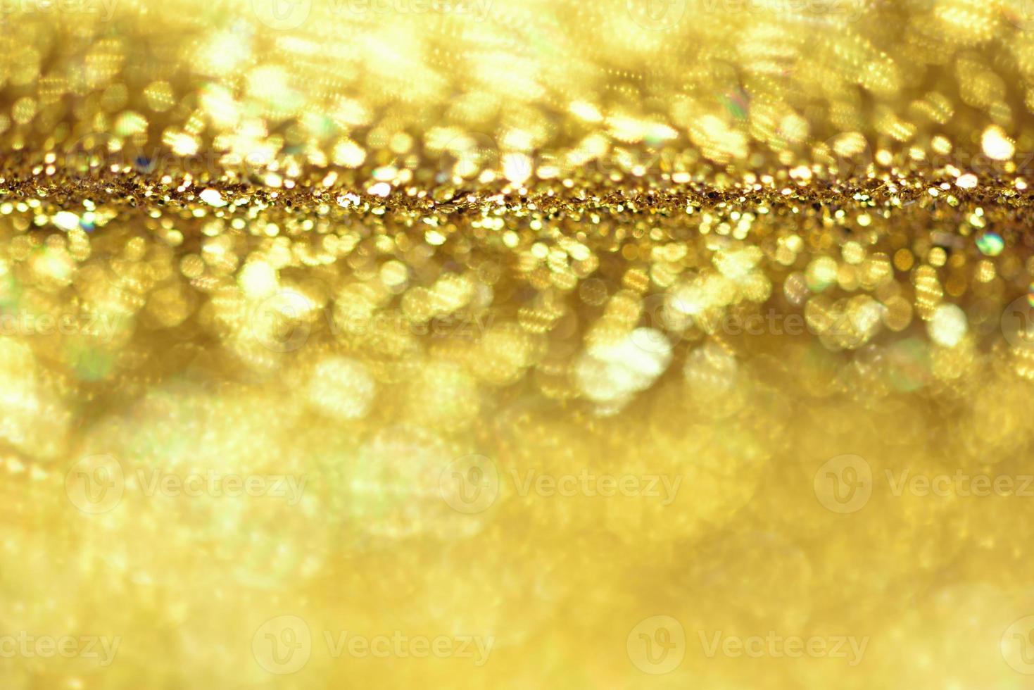 texture d'éclairage bokeh de paillettes dorées fond abstrait flou pour l'anniversaire, l'anniversaire, le mariage, le réveillon du nouvel an ou noël photo