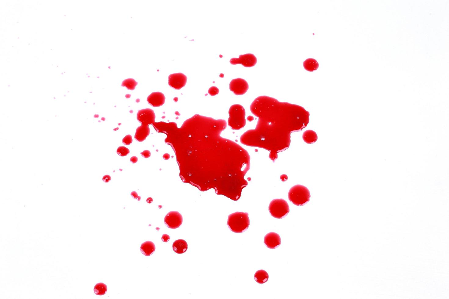 taches de sang isolé sur fond blanc photo