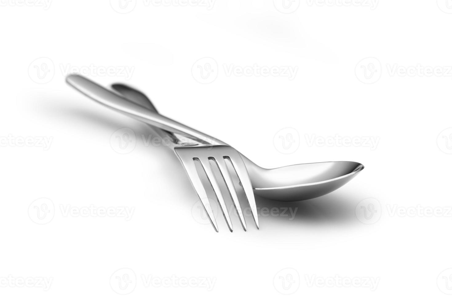 cuillère et fourchette sur fond blanc photo