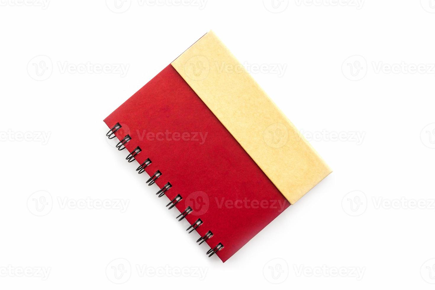 livre de journal rouge sur fond blanc. photo