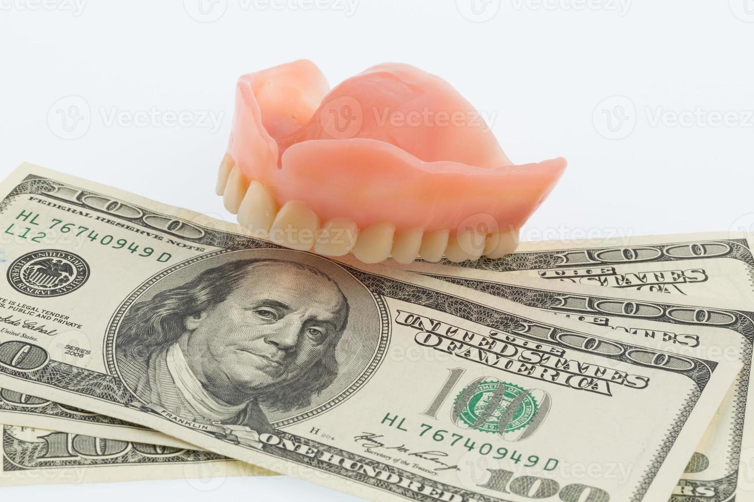 dents et billets d'un dollar photo