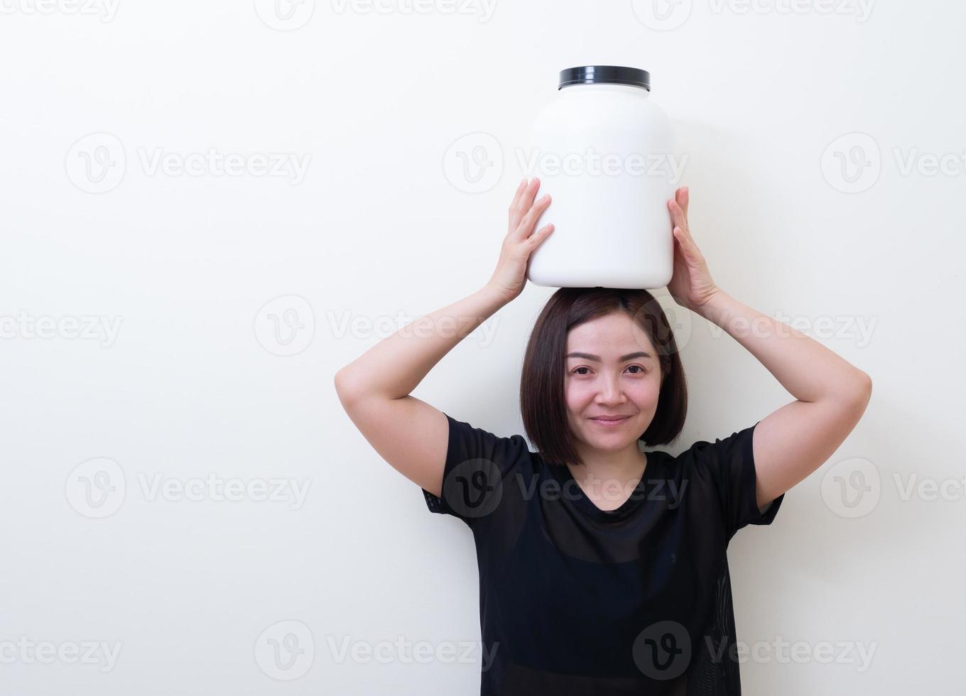 femme sportive avec des protéines de lactosérum photo