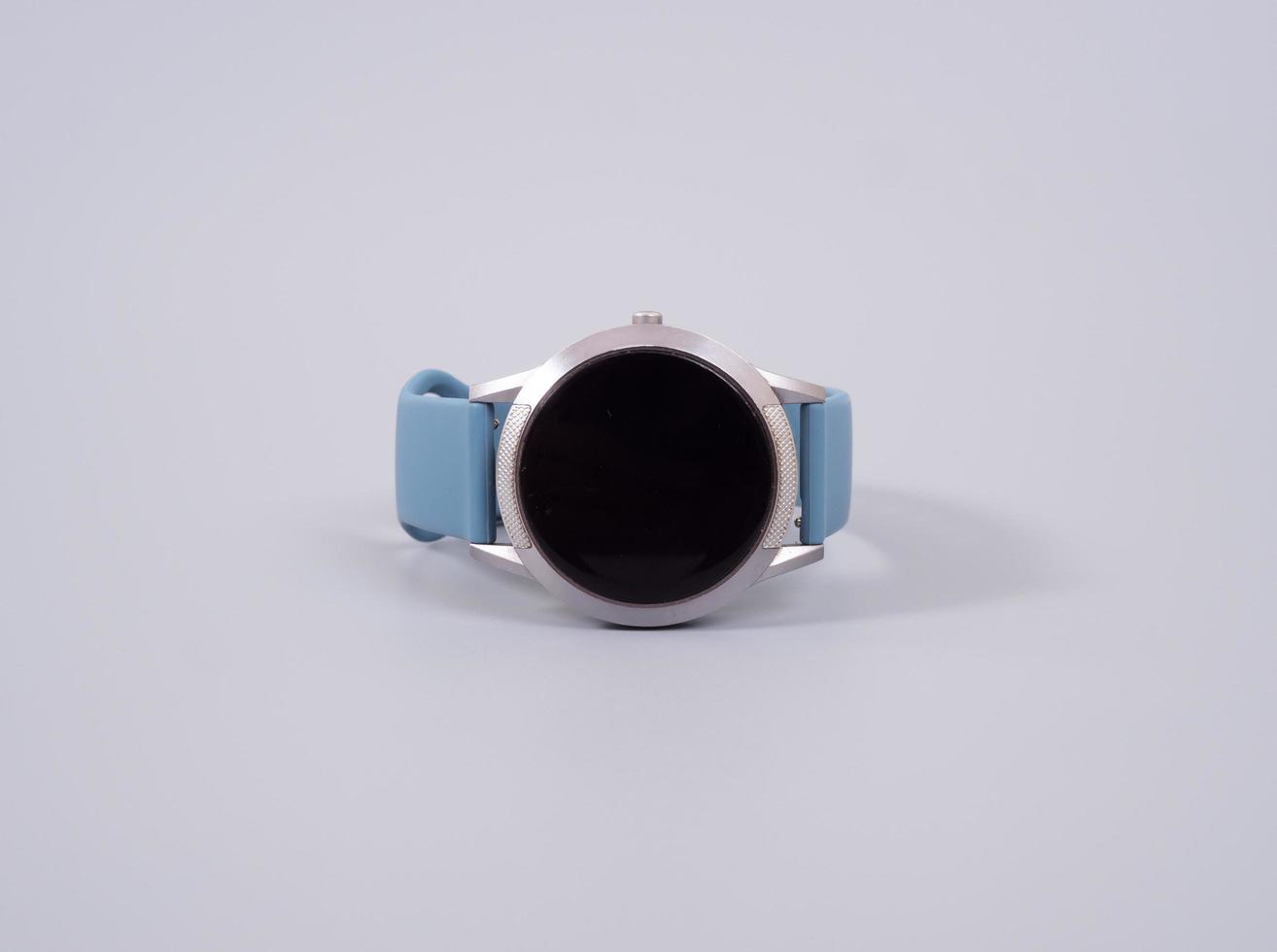 smartwatch placé sur une table grise rugueuse photo