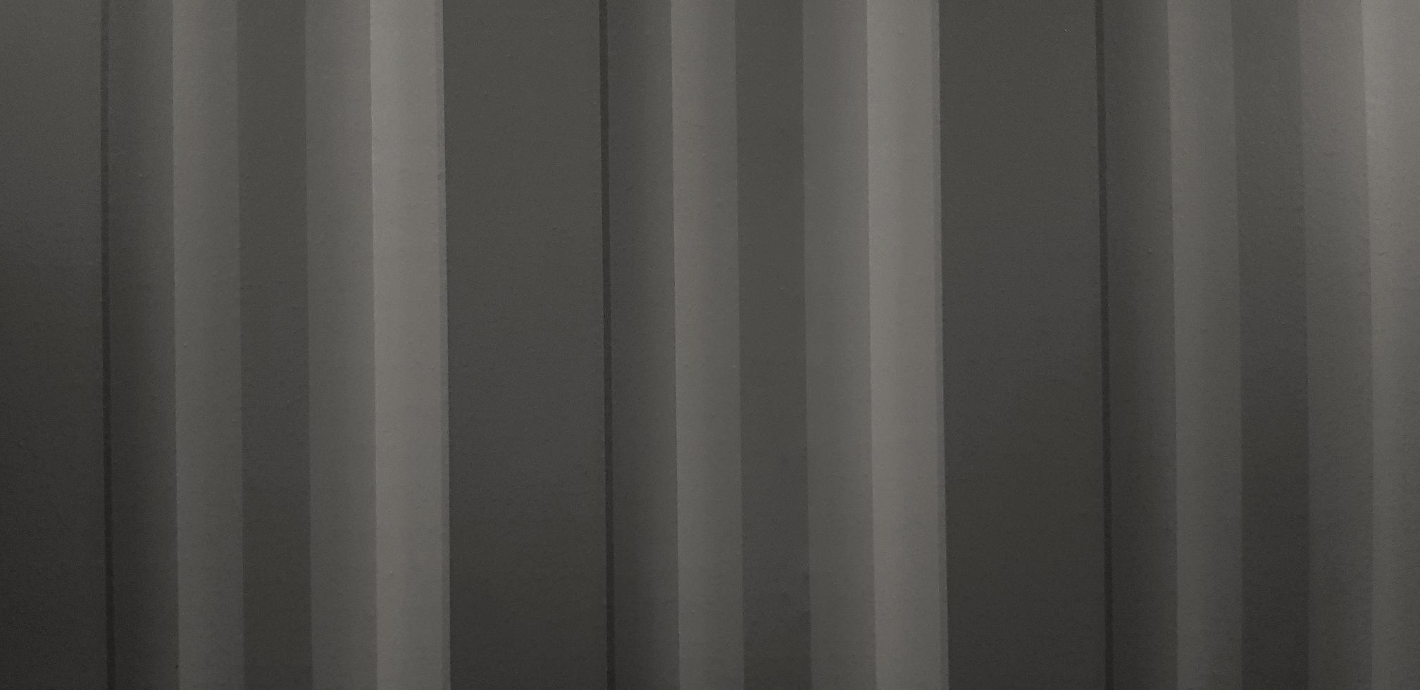 motif de ligne de fond gris foncé. papier peint ou mur gris. photo