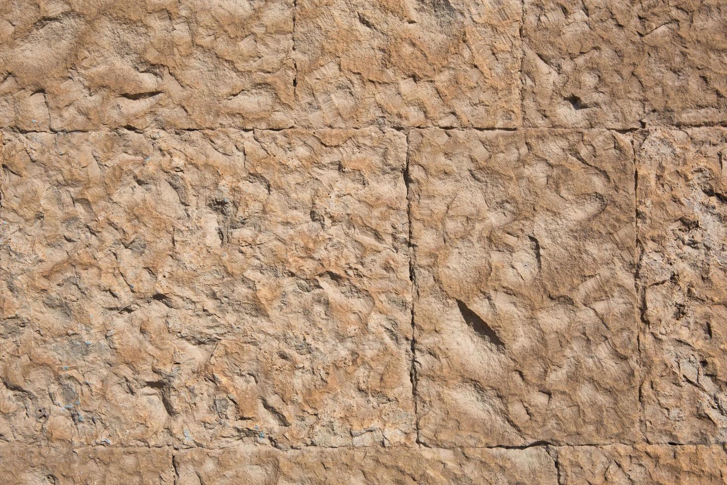 murs en maçonnerie de couleur sable naturel. gros plan de texture de pierre, fond de construction et d'exploitation minière. photo