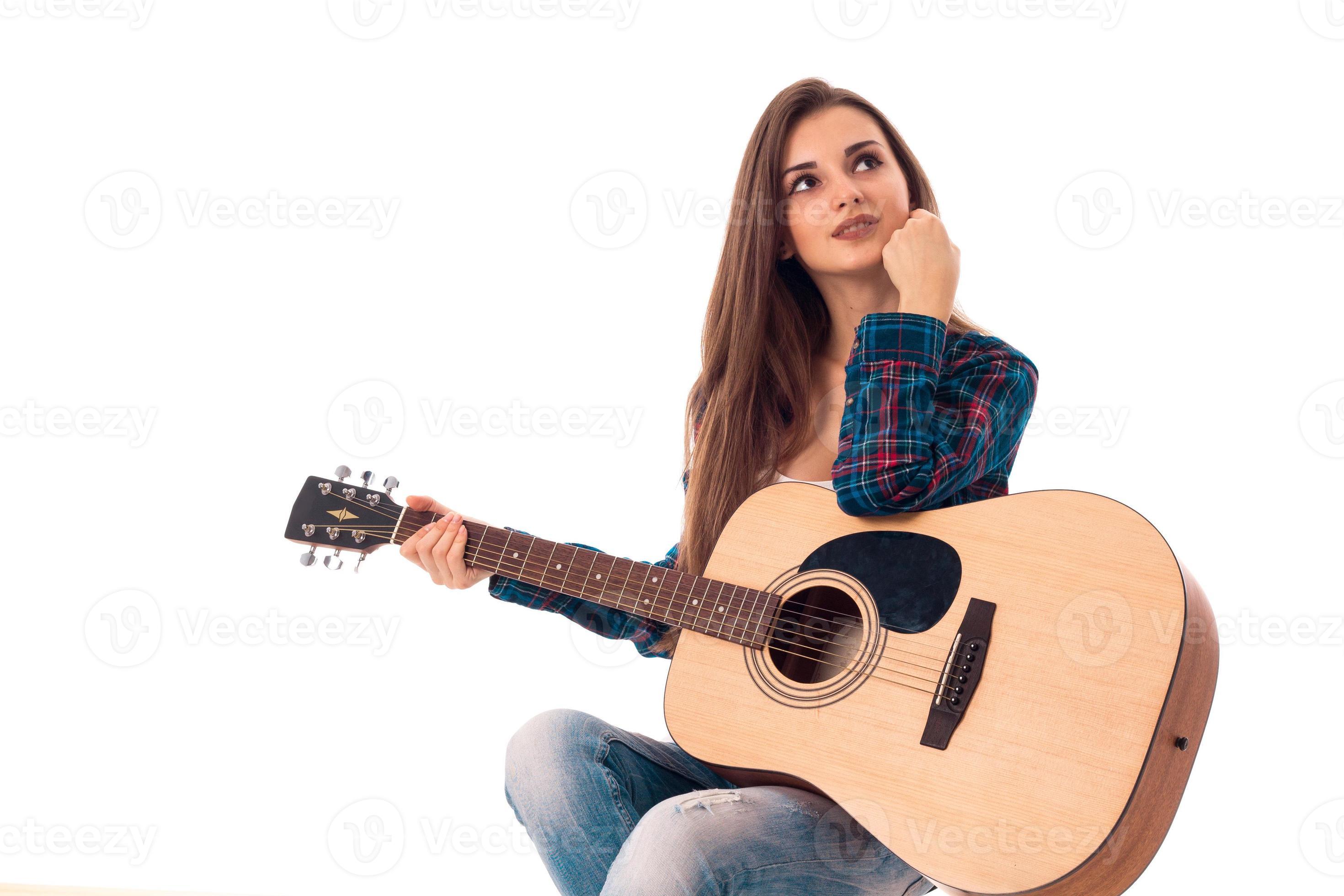 jeune fille séduisante avec guitare 16508473 Photo de stock chez Vecteezy