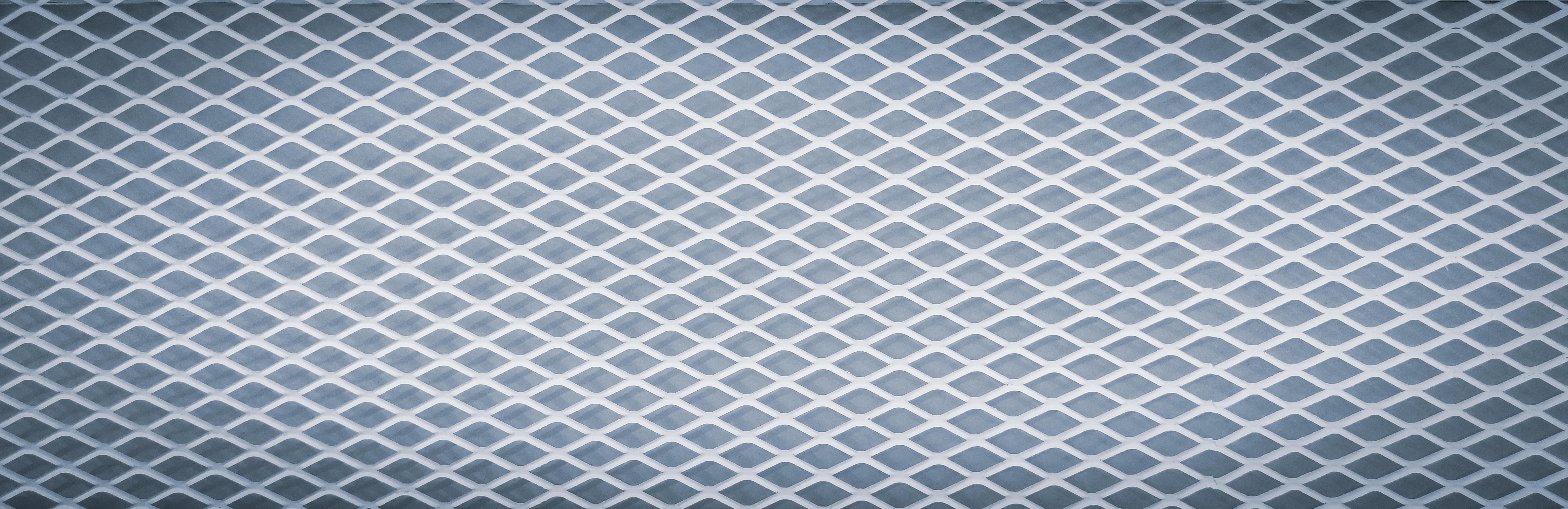 Surface De La Grille Métallique. Fond De Texture De Maille