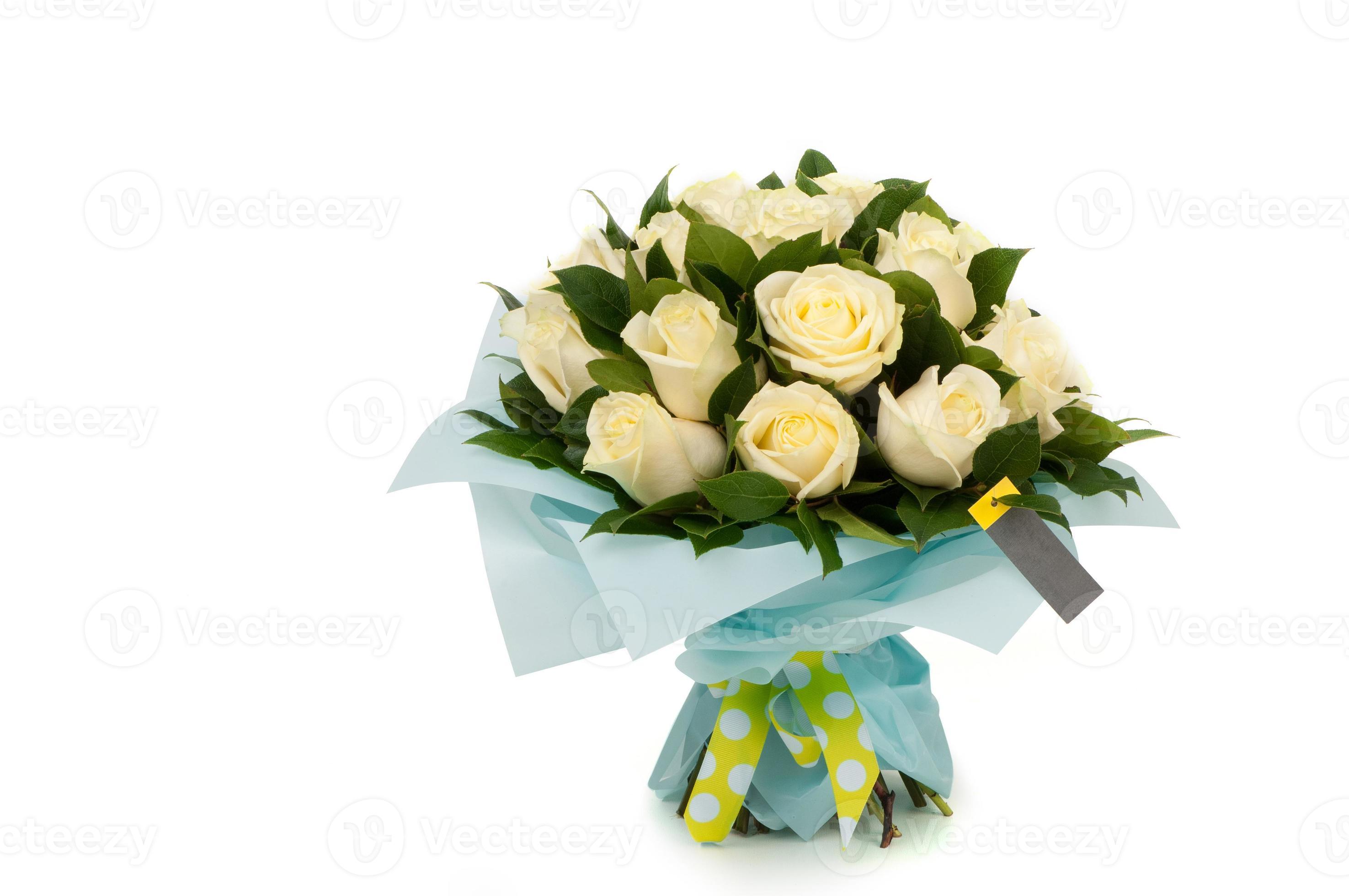 roses jaunes dans un bouquet de papier attaché ruban sur fond blanc. La  Saint-Valentin 5139496 Banque de photos