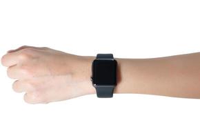 Main de femme portant smartwatch isolé sur fond blanc photo