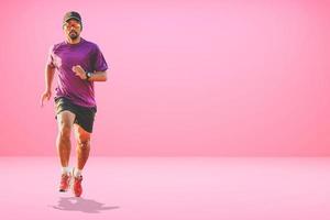 homme asiatique en bonne santé courant sur fond coloré avec fond. photo