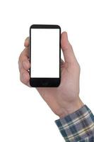 main masculine tenant un téléphone mobile avec écran tactile blanc vierge sur fond blanc. photo