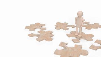une figure humaine en bois sur un puzzle pour un rendu 3d d'arrière-plan. photo