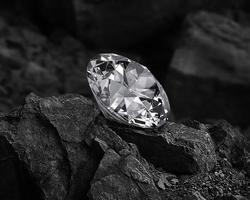 diamant sur fond de charbon noir photo