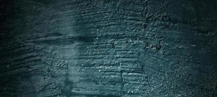 fond de pierre noir foncé. texture de béton noir effrayant. fond de mur de pierre. photo
