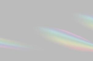 résumé de la superposition de lumière de prisme arc-en-ciel floue sur fond gris pour la maquette et la décoration photo