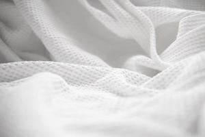 l'arrière-plan du motif de texture de tissu blanc. photo