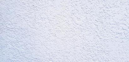 mur de béton blanc pour le fond. maçonnerie peinte ou papier peint rugueux. design extérieur dans le concept de style loft.
