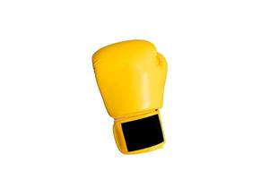 fond isolé de gants de boxe jaunes. photo